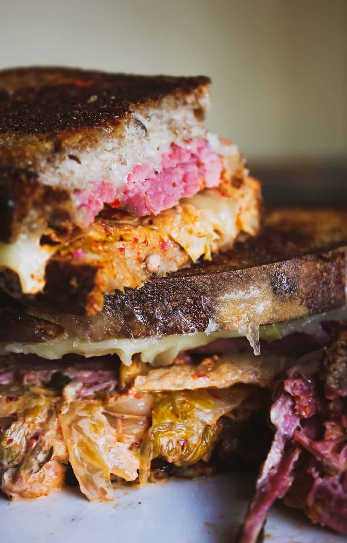 Spicy Kimichi Reuben stacked on plate