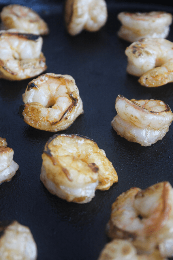 browned shrimp in cast iron skillet close up
