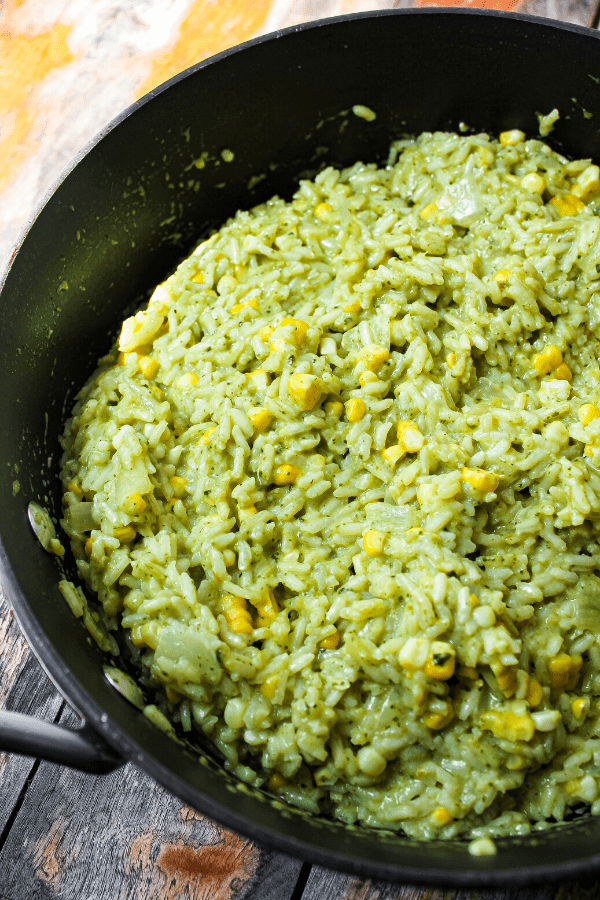 creamy poblano rice w/ corn in sauté pan 
