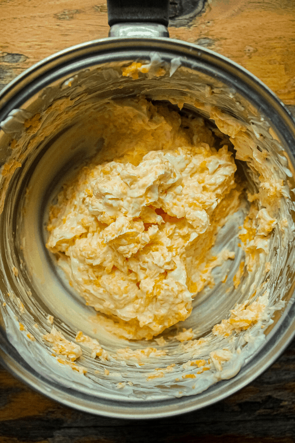 cream cheese and cheddar mixture in small sauce pan from above 