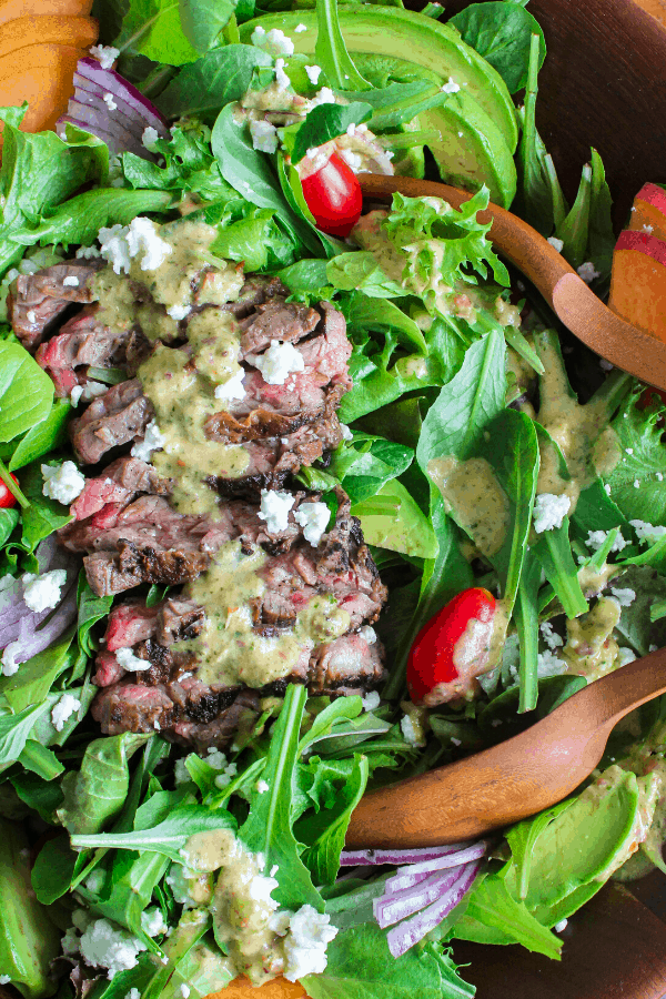 Close-up of grilled steak salad shot from above. 