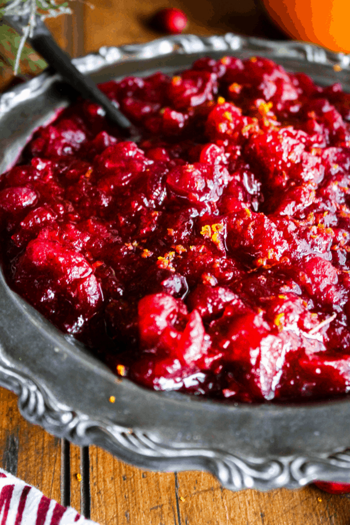 Close-up of cranberry sauce with cardamom and orange zest.
