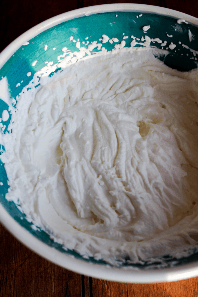 Whipped goat cheese in a bowl.