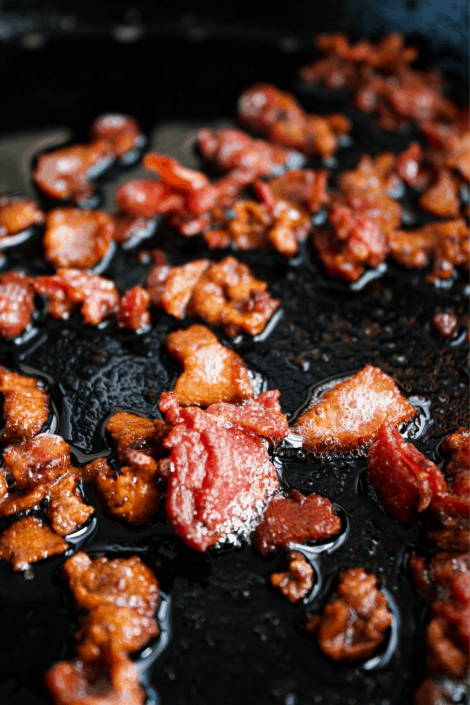 Close up of fried bacon in skillet.