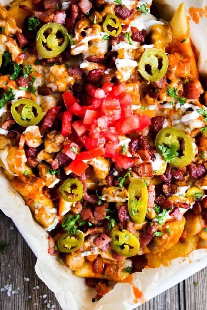 Loaded fries on a platter.