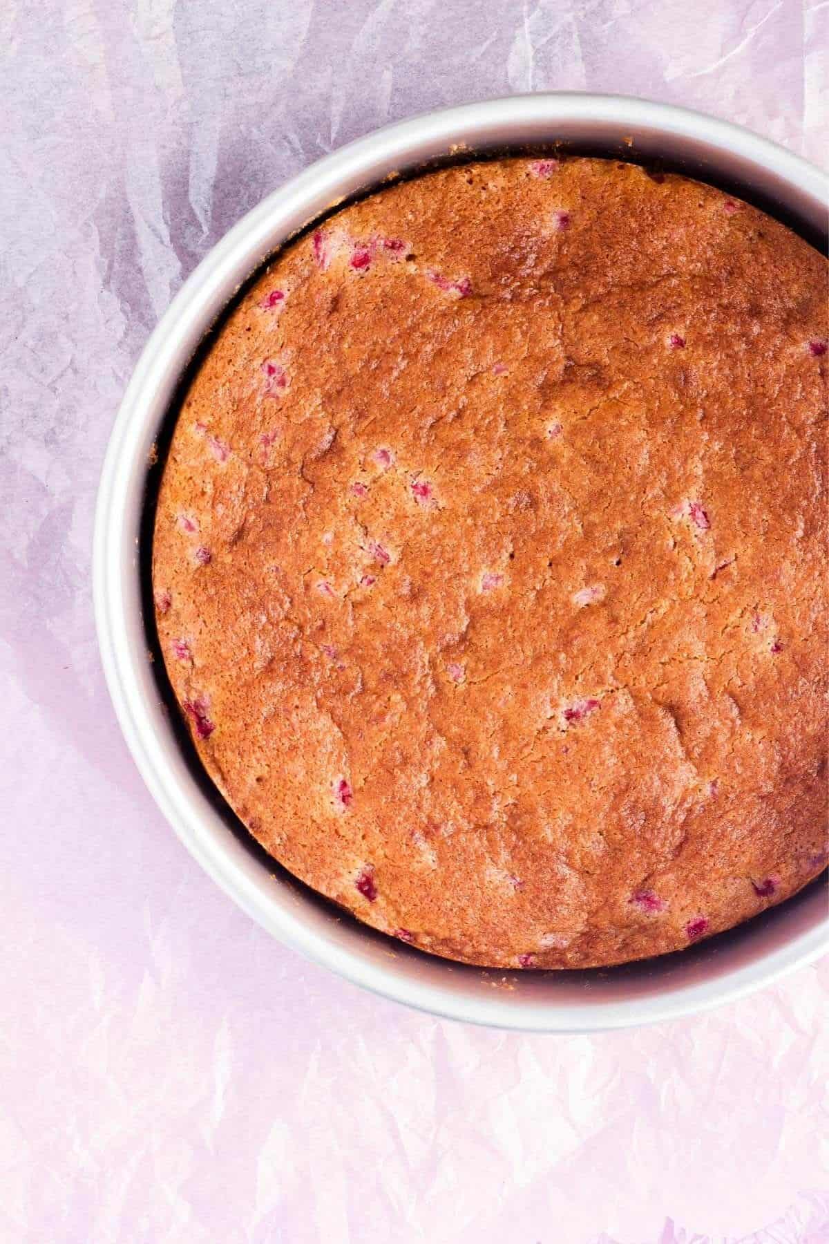 Cooked strawberry cake in pan.