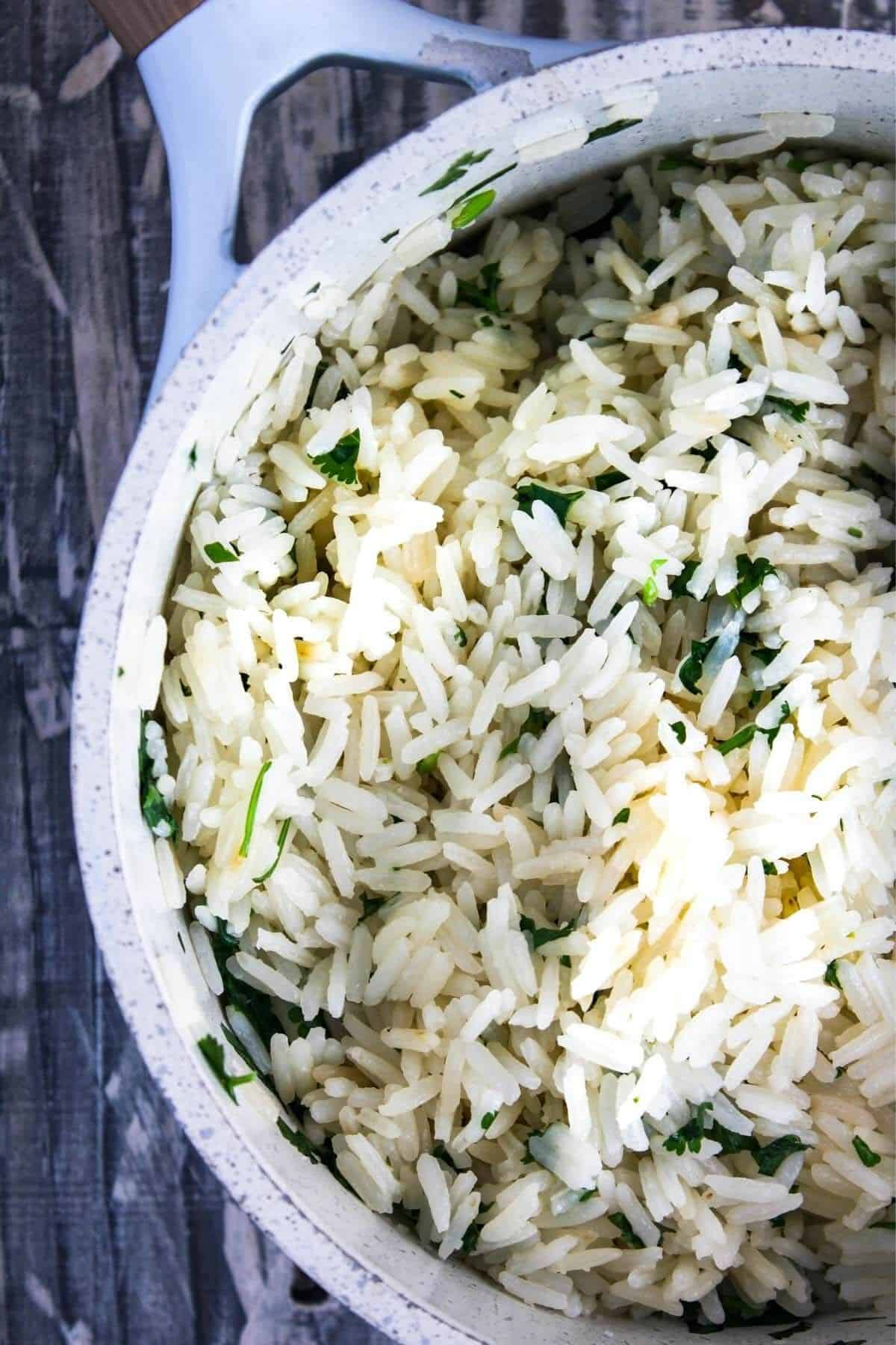 Cilantro lime rice in a sauce pan.