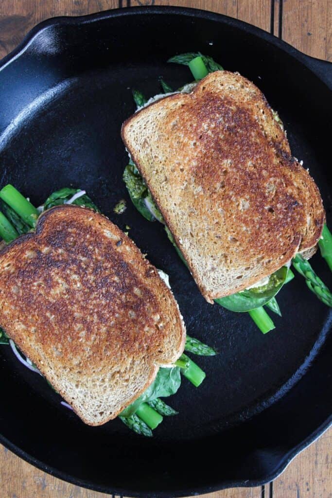 Pesto grilled cheese in a cast-iron skillet. 