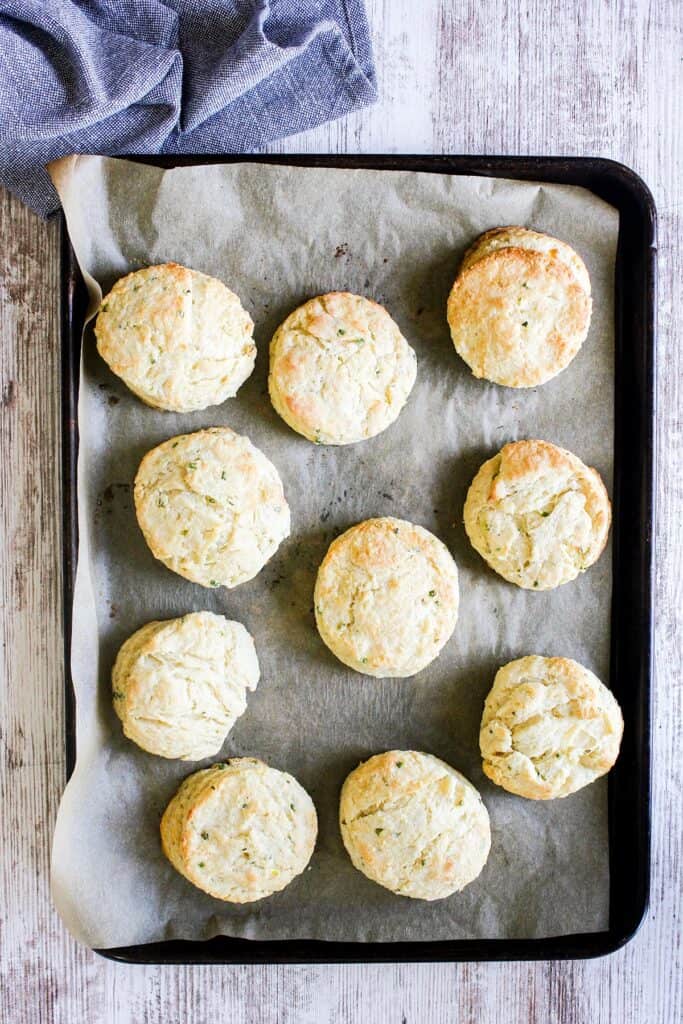 Cooked biscuits on sheet pan.