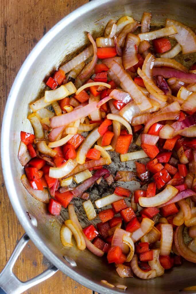 Sautéed red bell pepper and red onion.