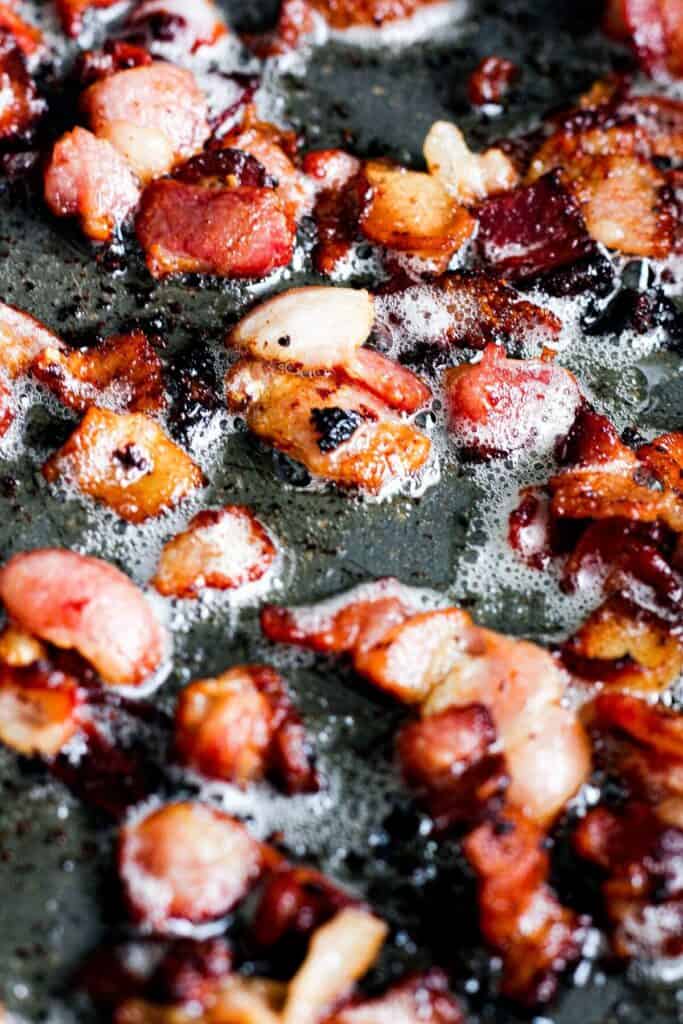 Close up of bacon cooking.