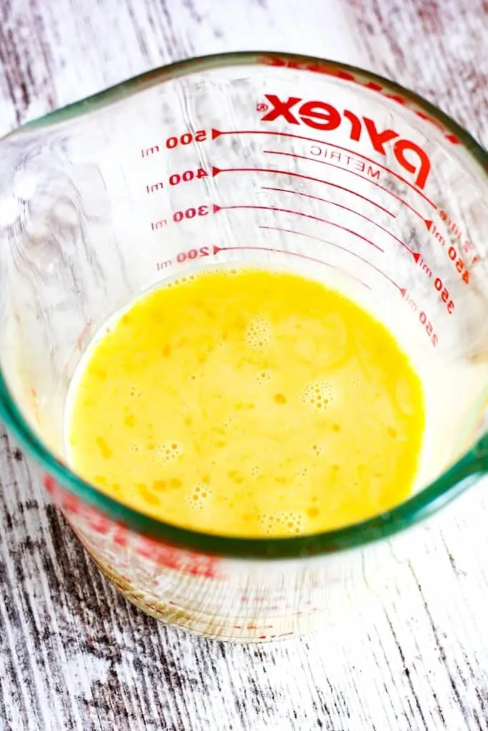 Liquid ingredients in a measuring cup.