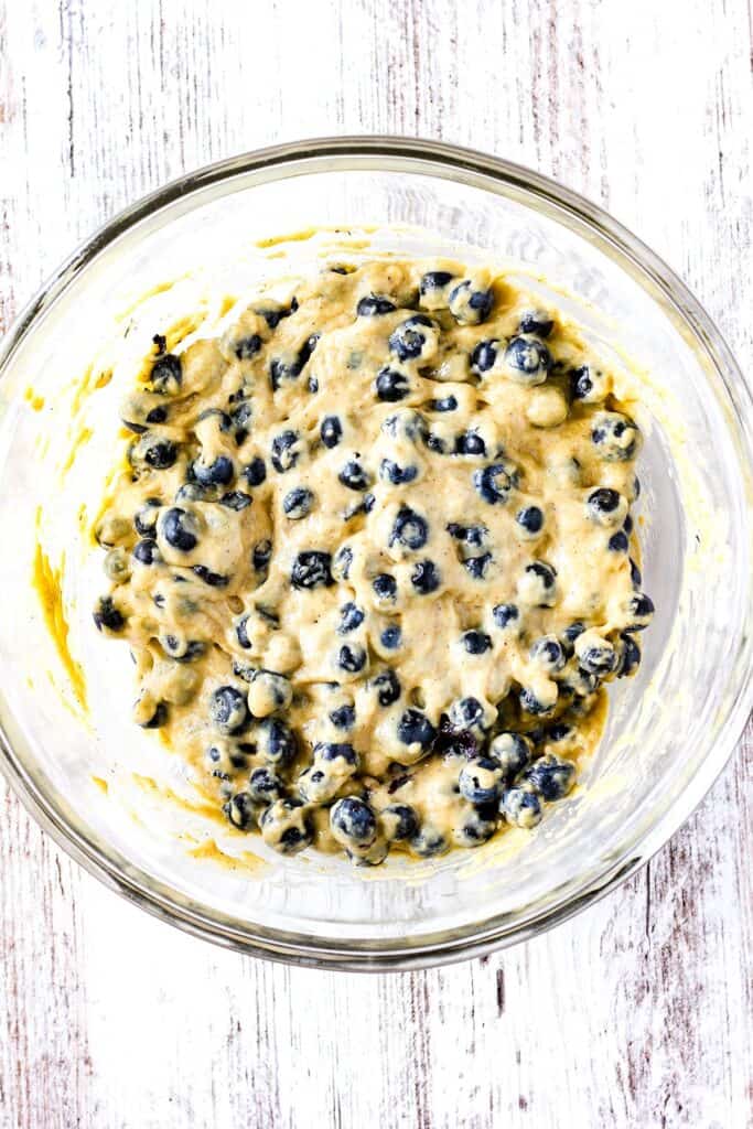 Blueberry fritter batter in a bowl.