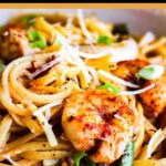Pinterest graphic for cajun chicken and shrimp pasta.