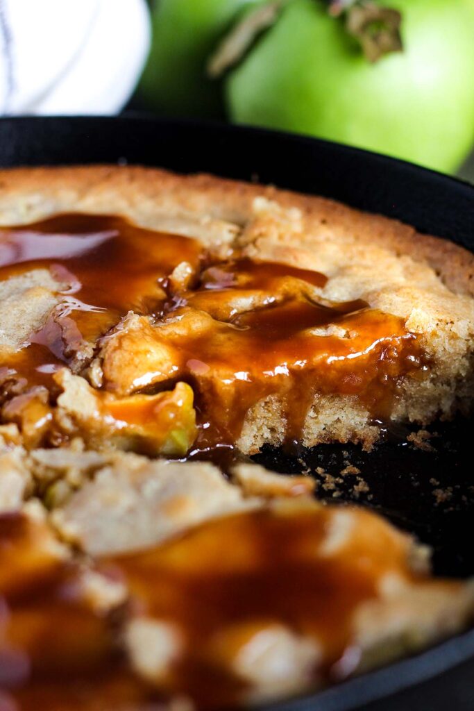 Close-up for apple caramel blondies with salted caramel sauce.