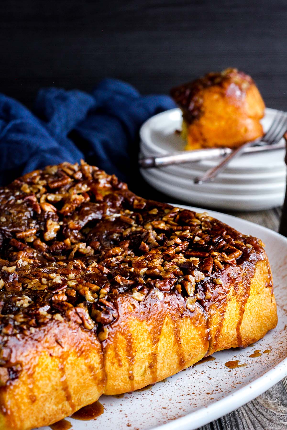 Pumpkin sticky rolls with maple pecan topping.