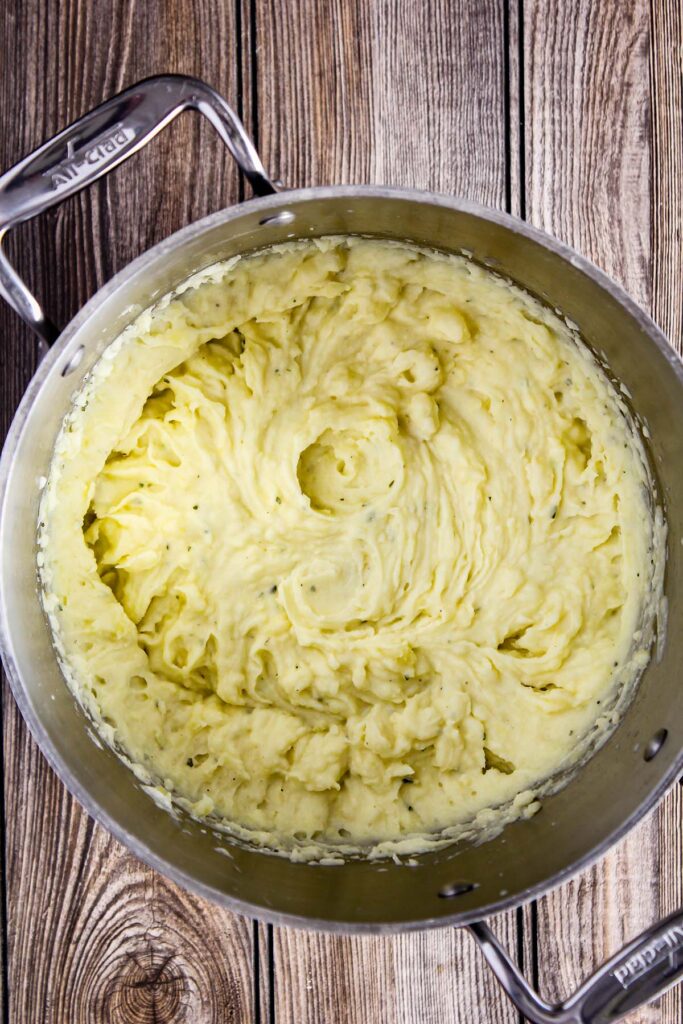 Mashed potatoes in a stock pot.