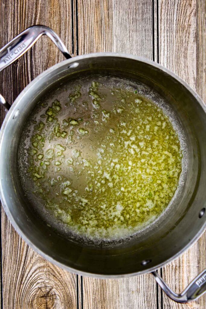 Sautéed garlic in stock pot.