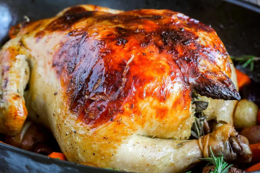Side view of orange juice brined chicken.