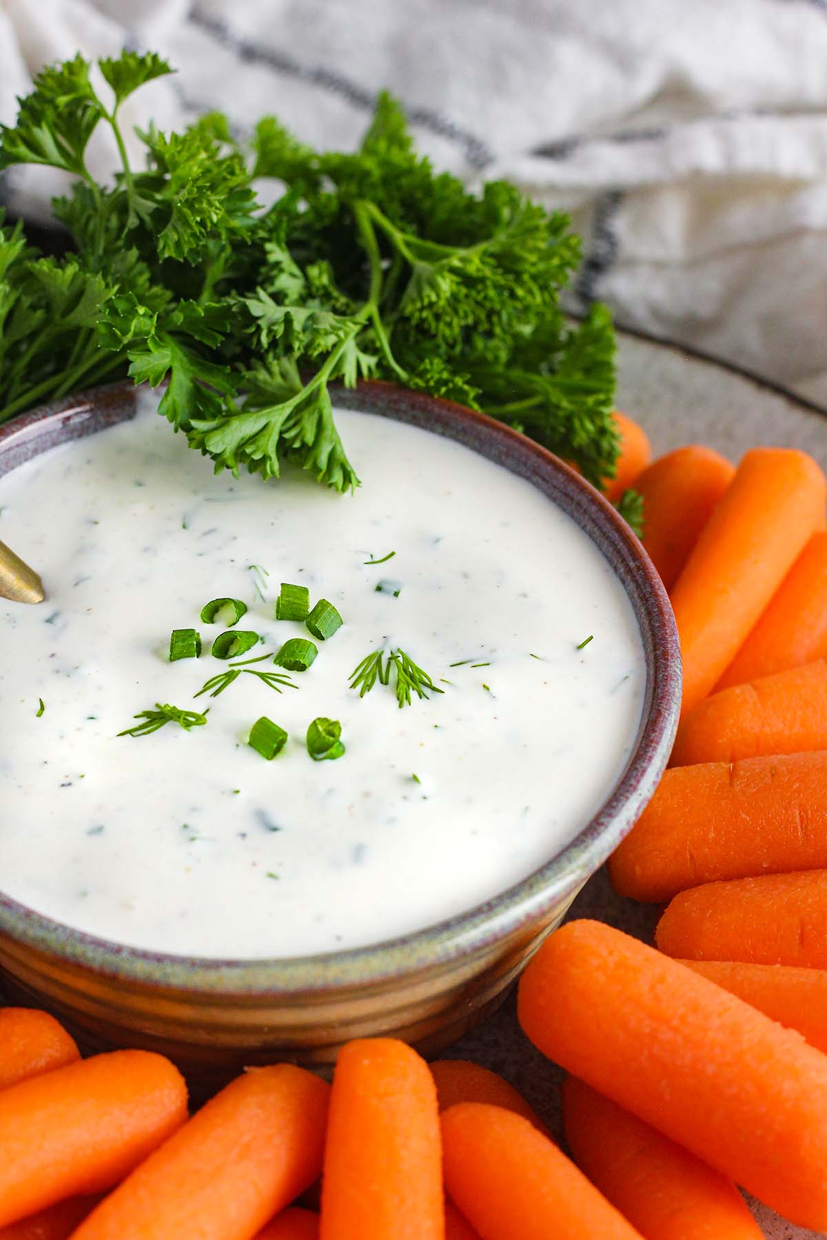 Bowl or ranch with carrots and parsley