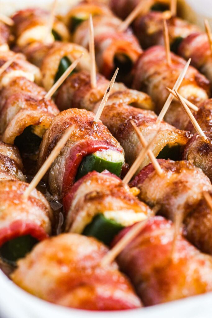 Close up of sweet and spicy jalapeno poppers with toothpicks