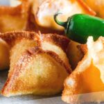 Pinterest graphic for wonton jalapeno poppers.