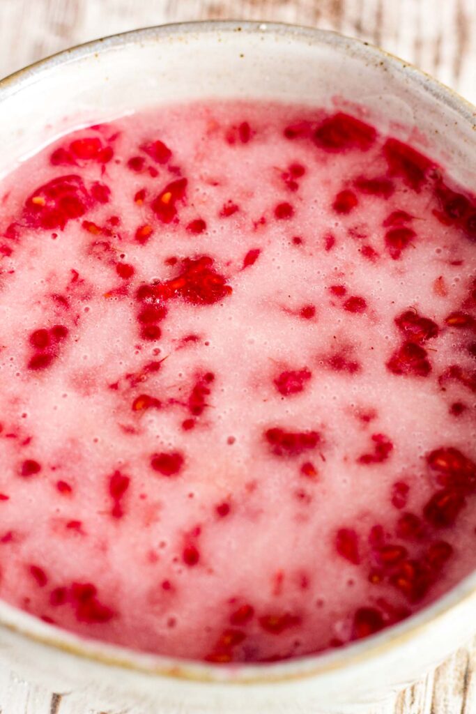 Raspberry glaze in a bowl.