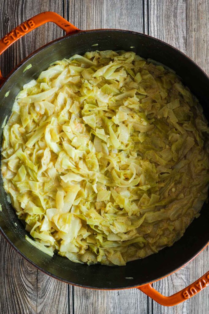 Mustard cabbage in a Dutch oven.
