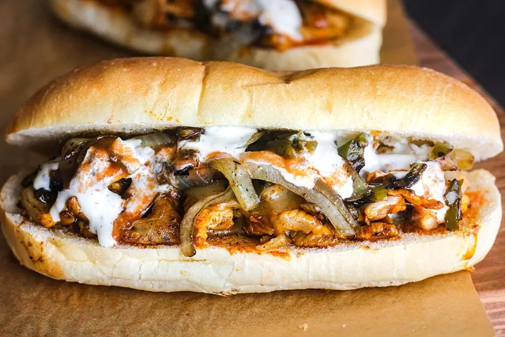 A single buffalo chicken cheesesteak sandwich.