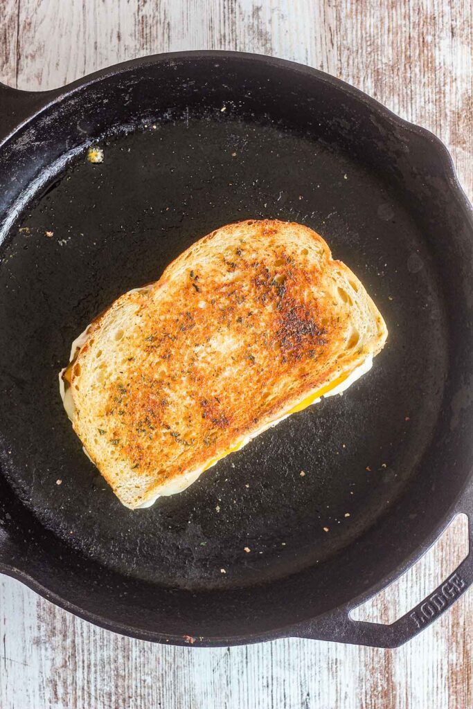 Grilled cheese in a cast iron skillet.