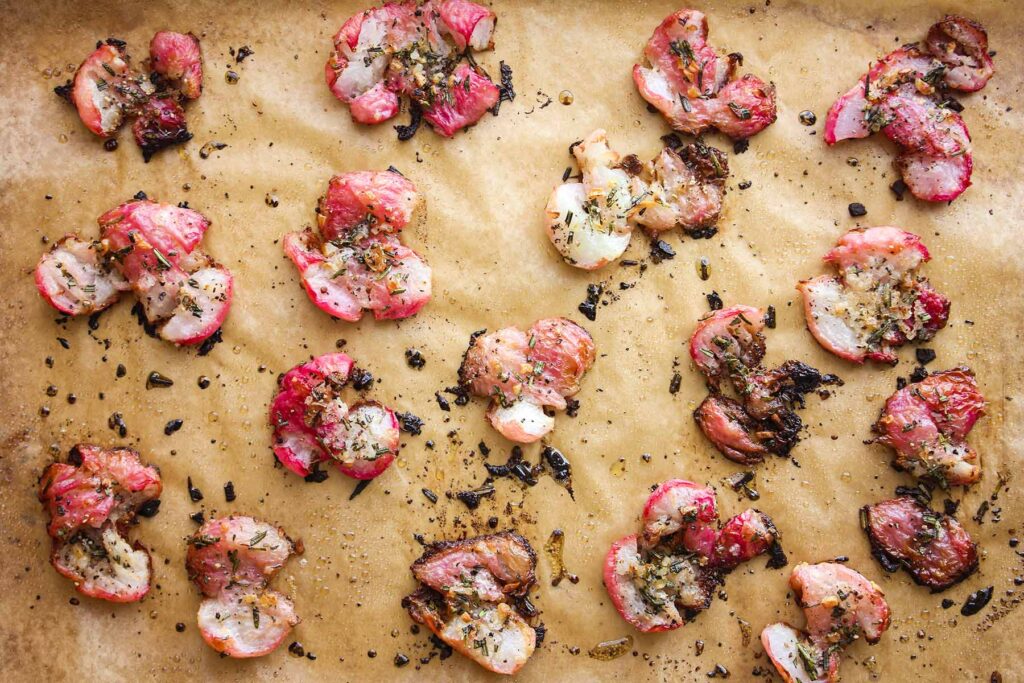 Smashed radishes with rosemary butter.