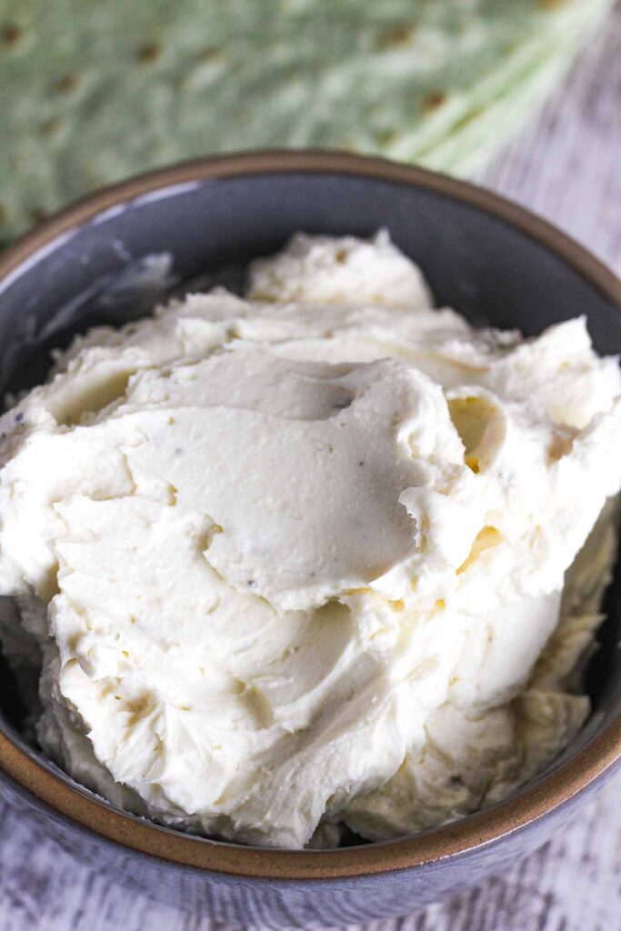 Boursin cheese and cream cheese mixture in a bowl.