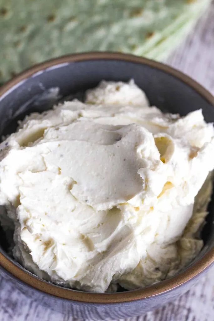 Boursin cheese and cream cheese mixture in a bowl.